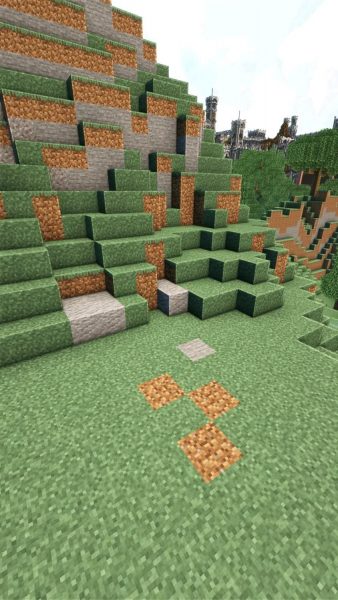 Hình ảnh Minecraft 3D trên nền cỏ xanh