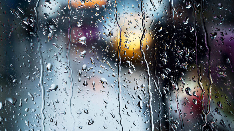 Background mưa buồn lên cửa sổ